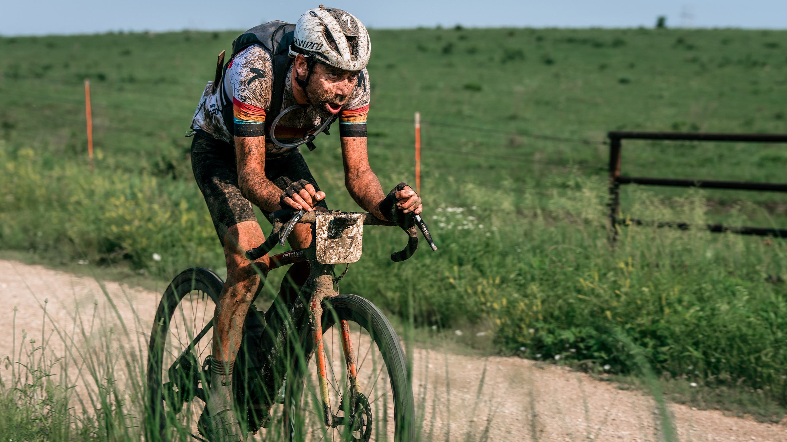 Homepage Lauren Sheader pedalling wearing cycling clothing LSRF 2024.