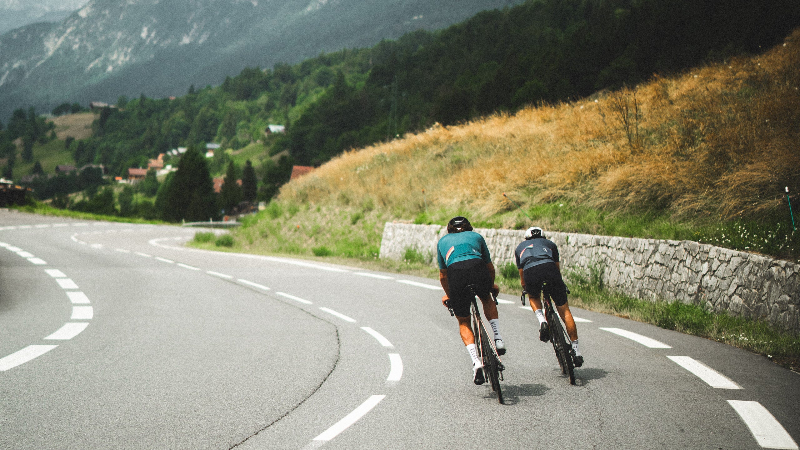 Homepage men pedalling wearing cycling clothing LSRF 2024.